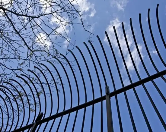 Secure bent top fence with angled design for extra protection.